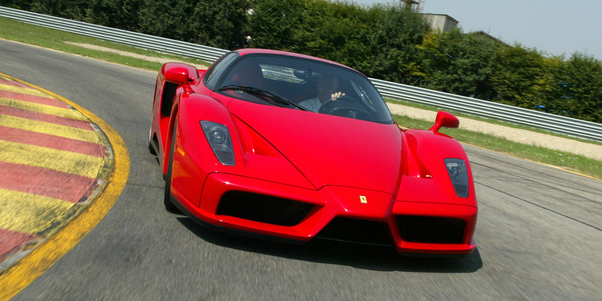 Ferrari driving around a corner on a race track