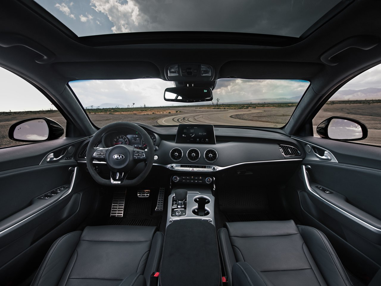 Interior view or a Kia Stinger GT S at the side of a race track
