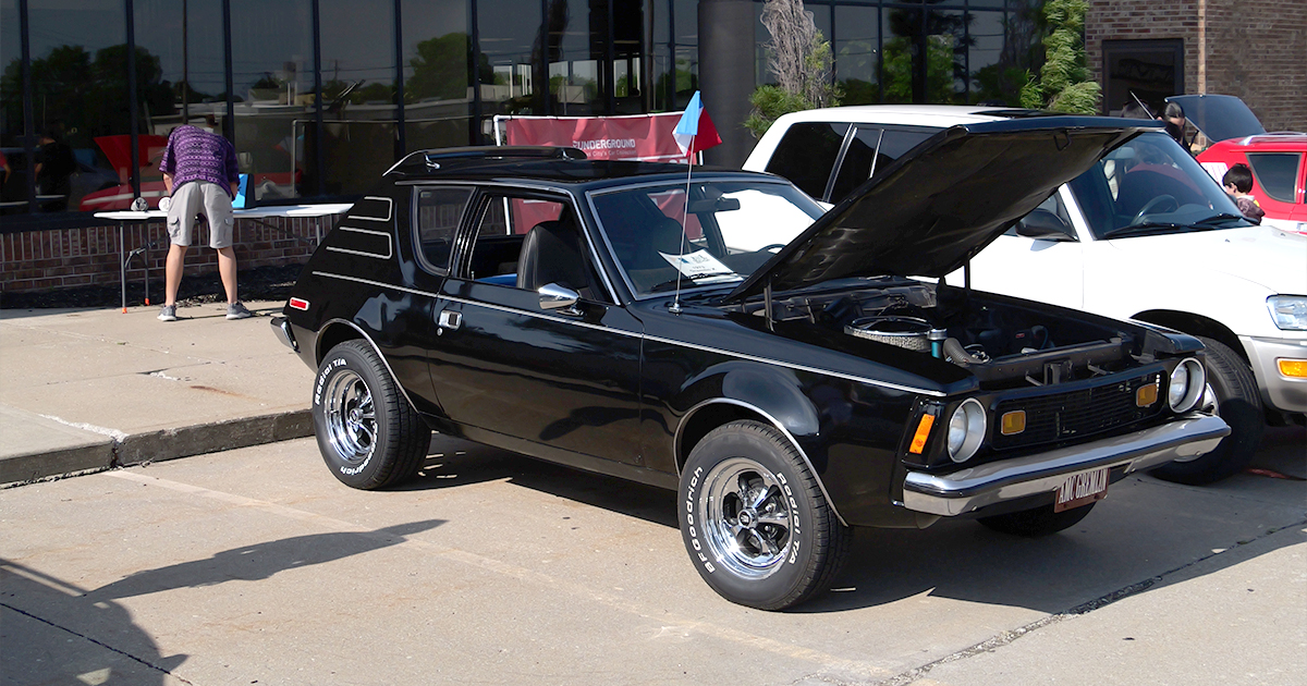 A black AMC Gremlin parked