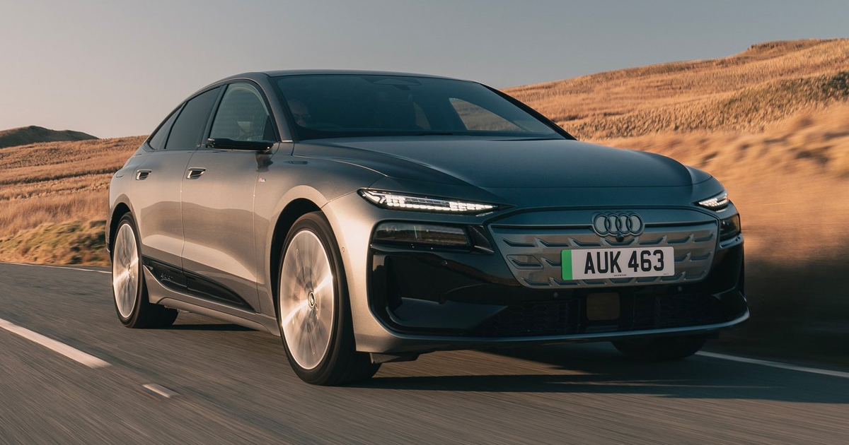 Black Audi A6 e-tron driving