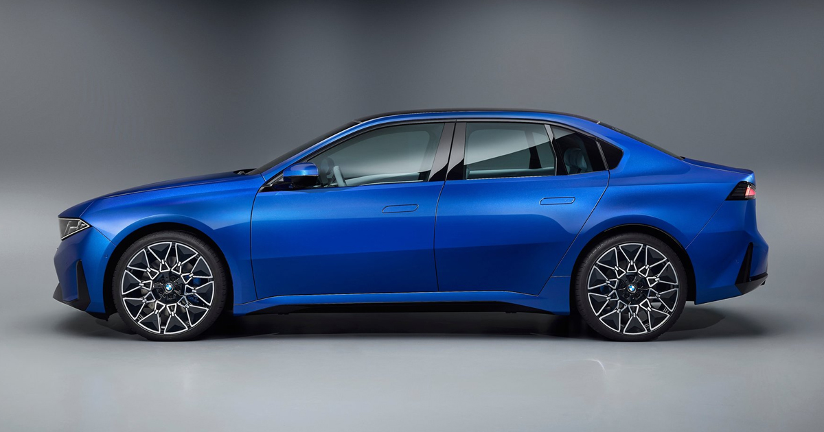 Side angle of a blue BMW i3 (2026)