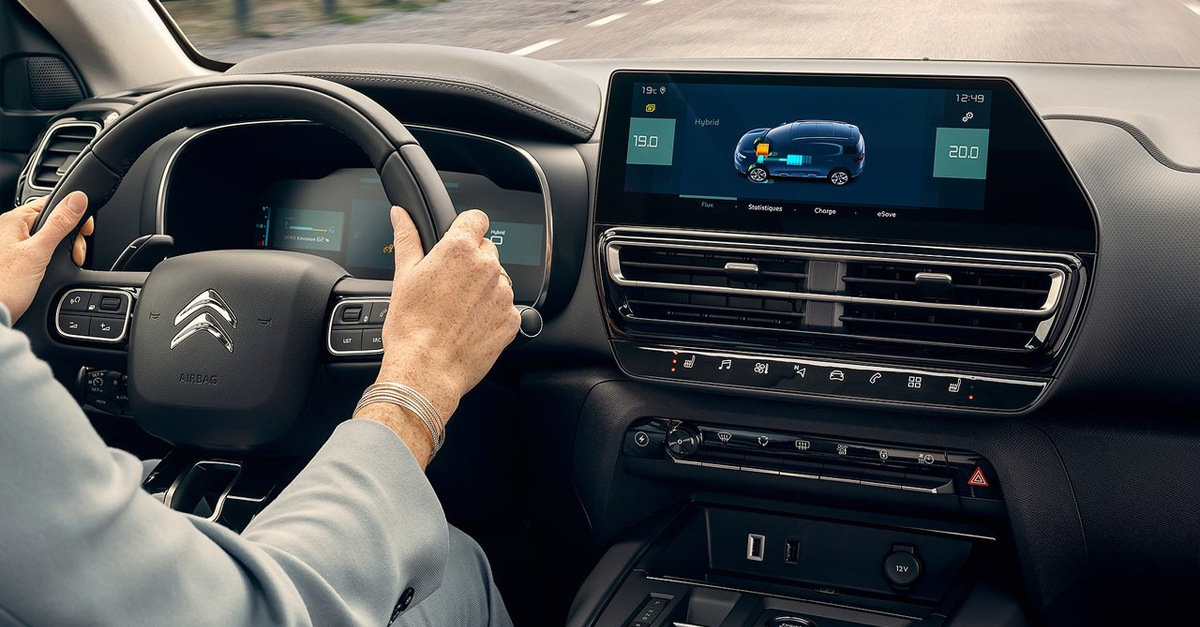 Someone with hands on the steering wheel of a Citroen C5 Aircross