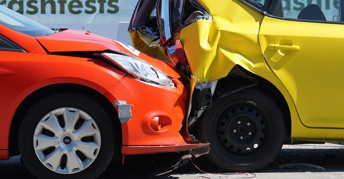 A car crashing into the back of another car