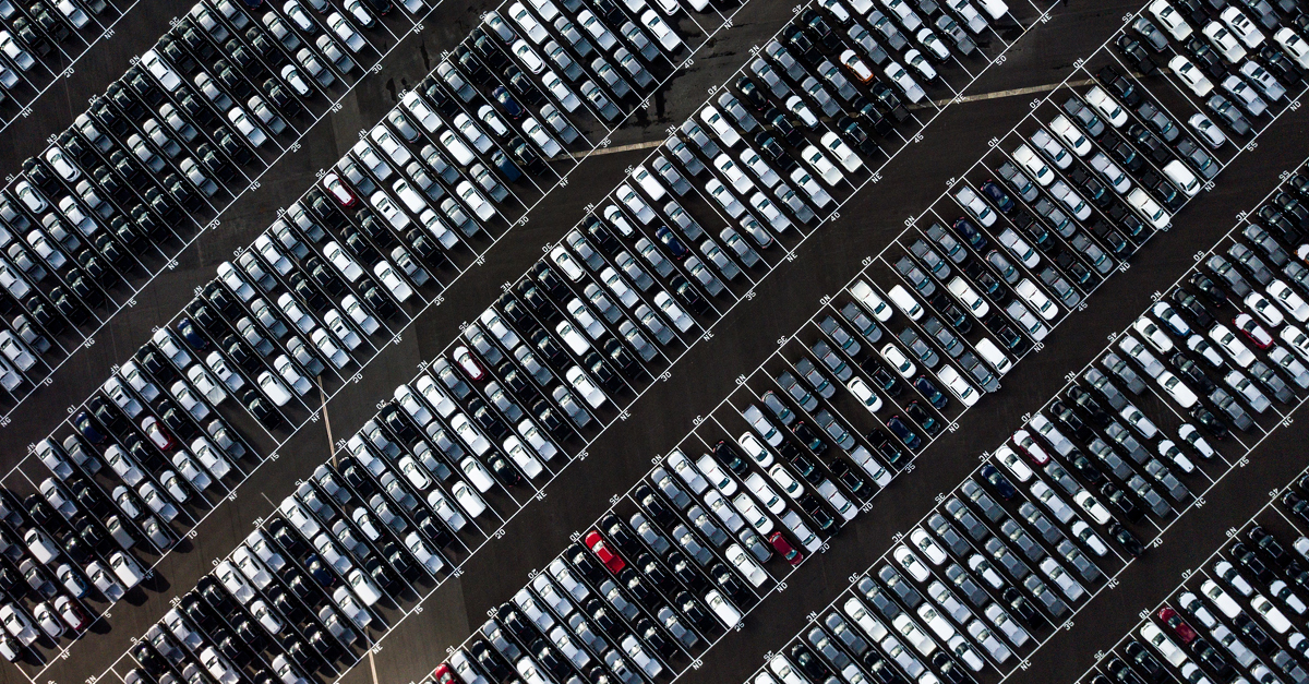 View from above of a car park with vehicles in every space