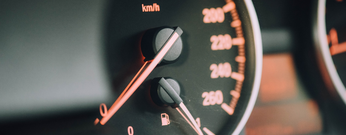 A close-up of a car's speedometer