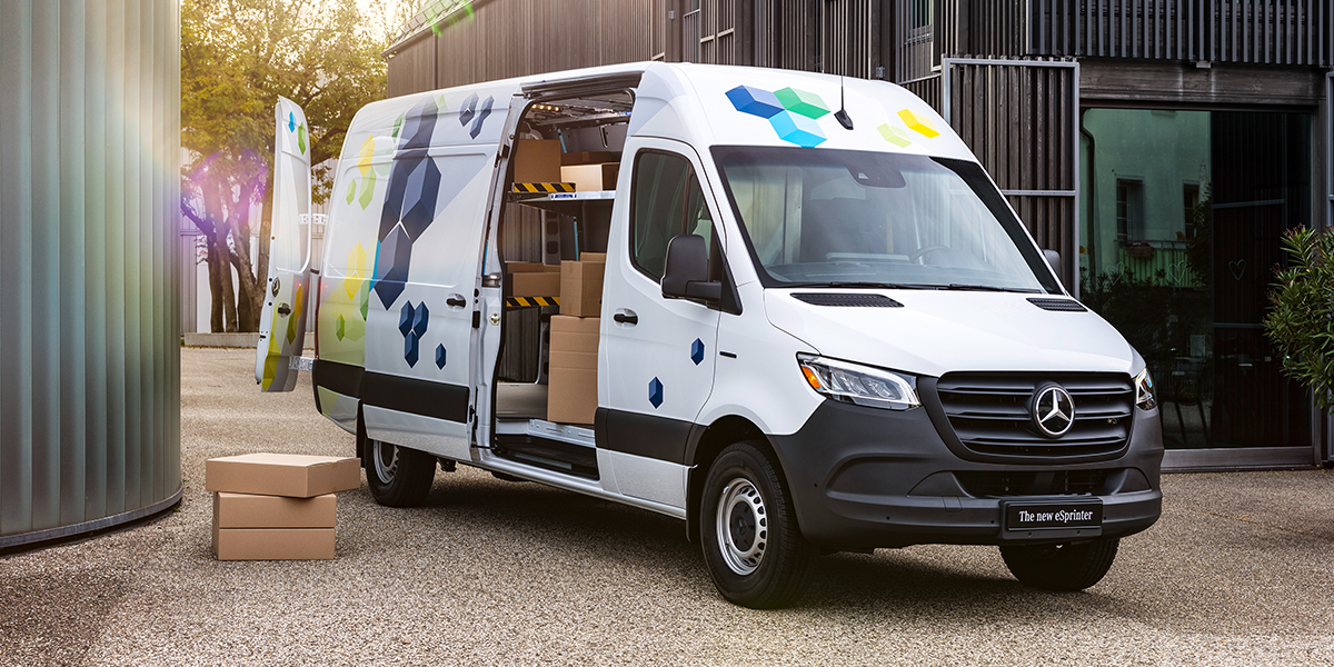 Front and side view of a Mercedes-Benz eSprinter with the side door open
