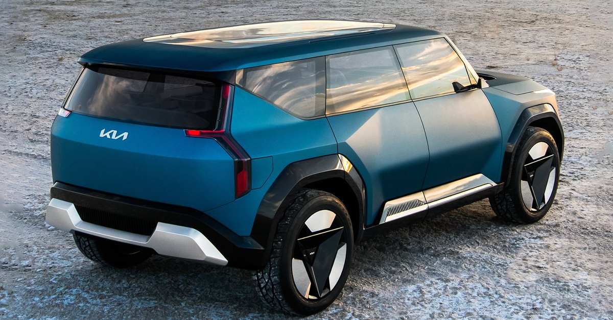 Rear view of a Kia EV9 parked on gravel