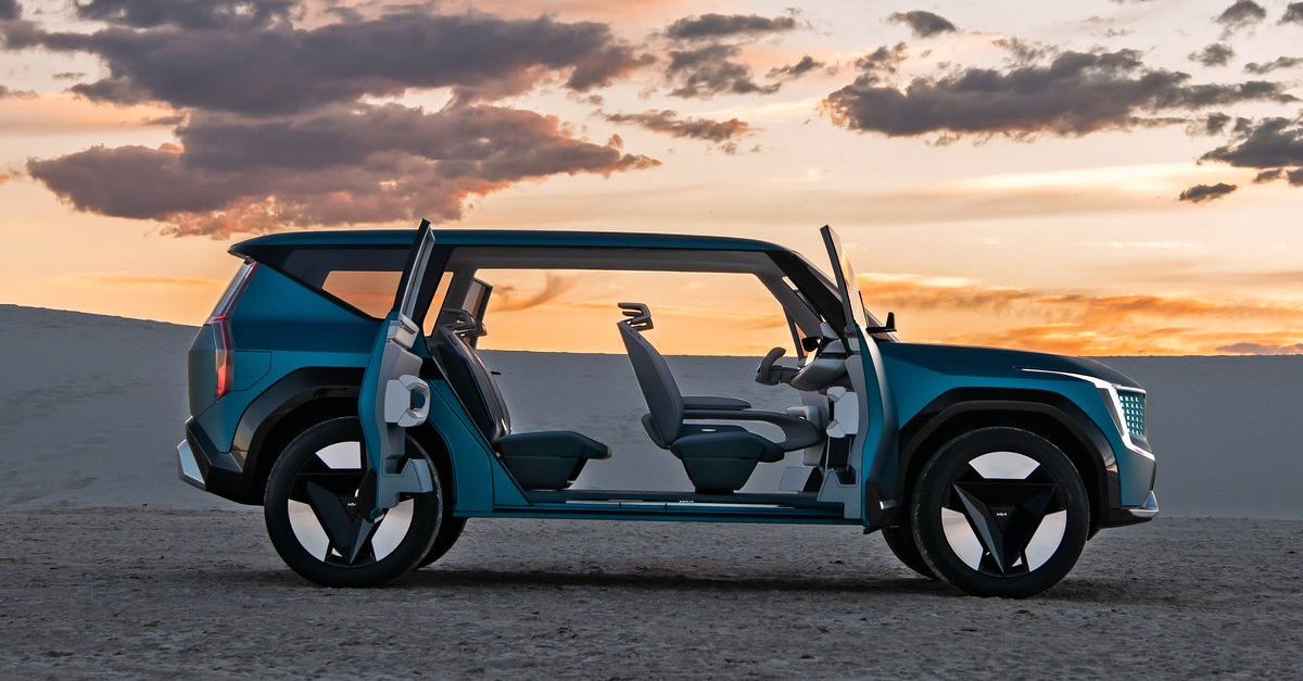 Side view of a Kia EV9 with all doors open