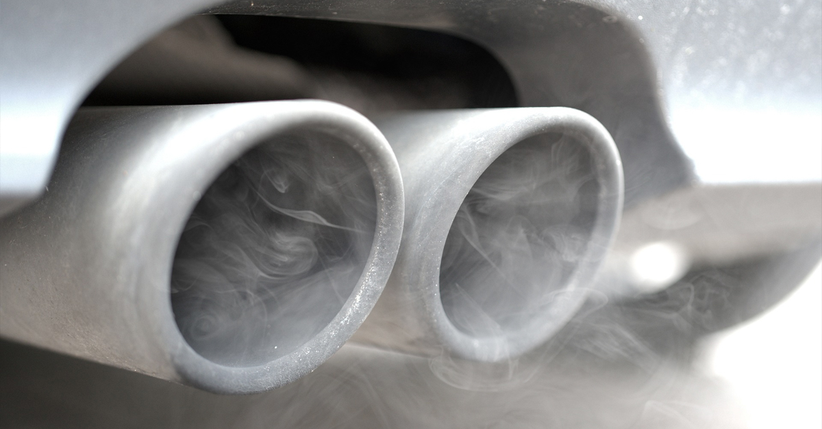 Close-up of a vehicle exhaust emitting fumes