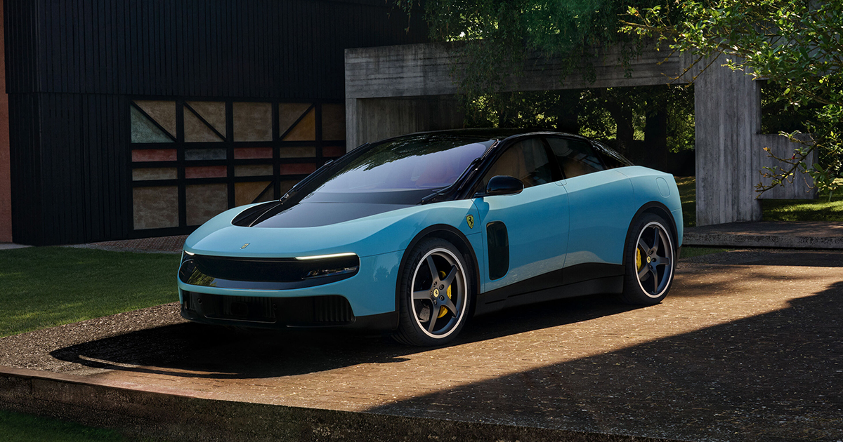 Front angle of a blue Ferrari Luce parked