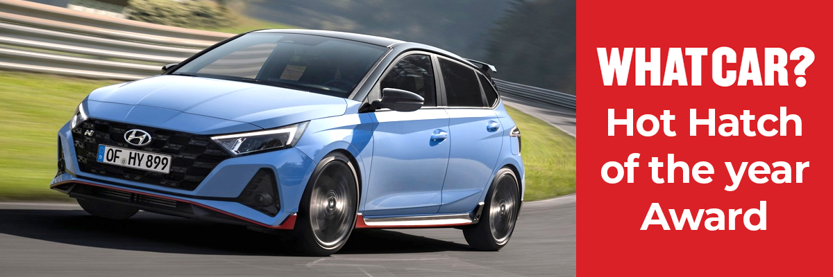A Hyundai i20 N driving on a race track