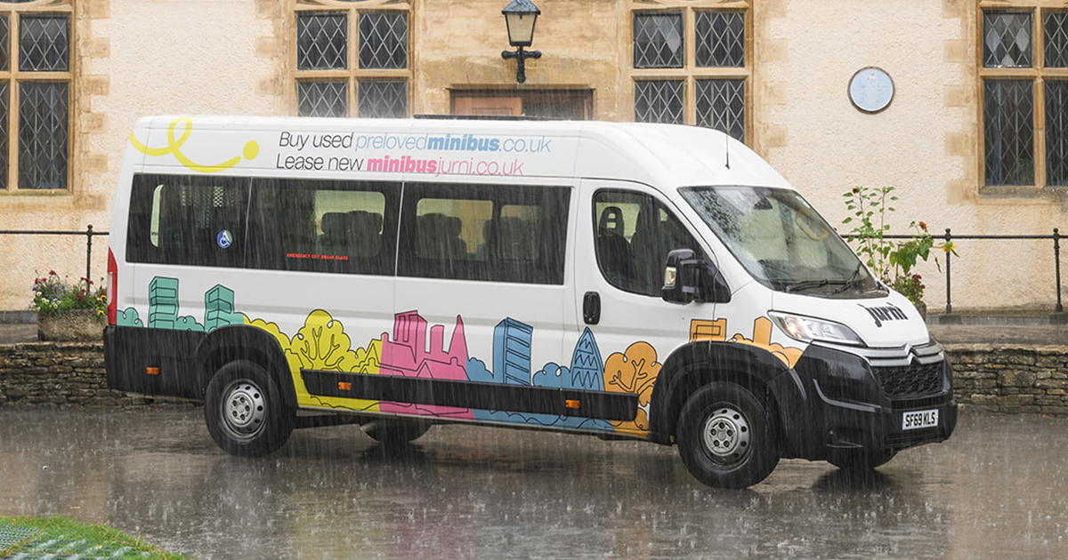 A Jurni branded minibus in the rain