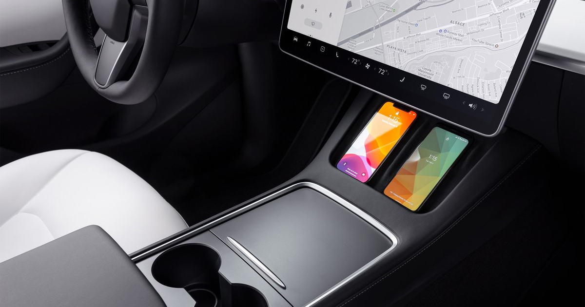 Interior shot of the Tesla Model Y's wireless charging pads