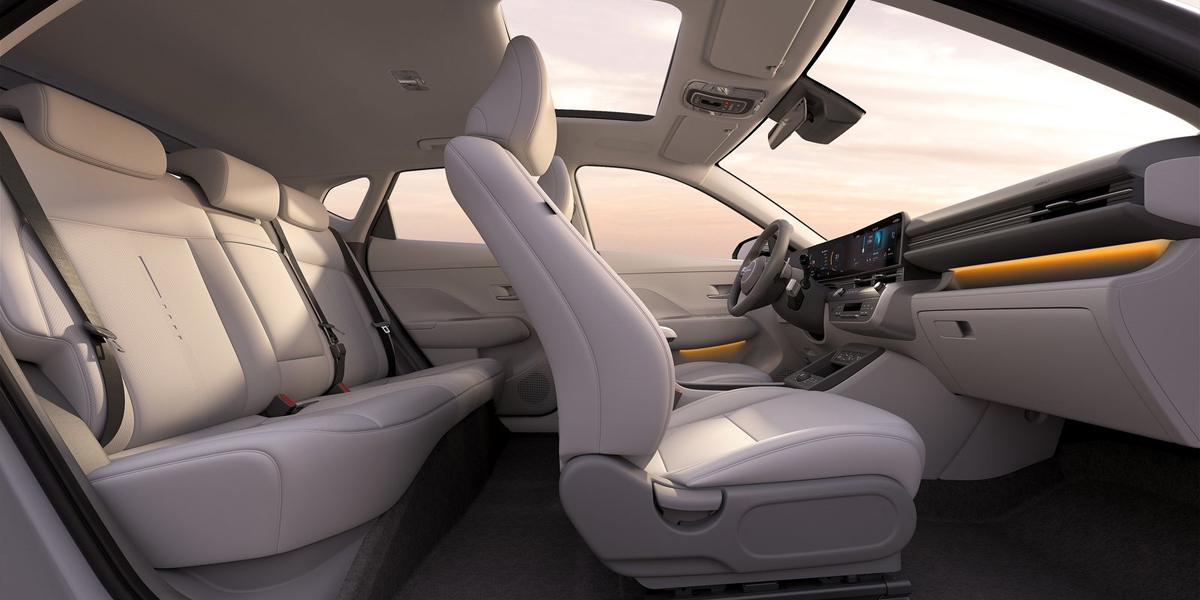 Interior view of a Hyundai Kona with the passenger side doors open