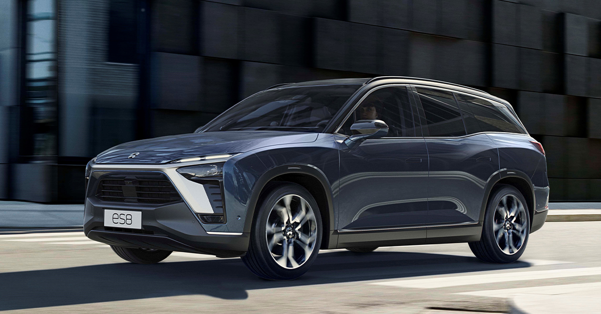 A NIO ES8 driving down a road