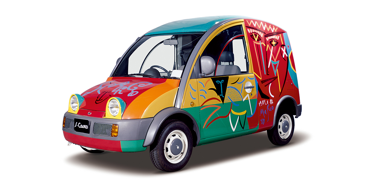 A Nissan S-Cargo with a colourful livery