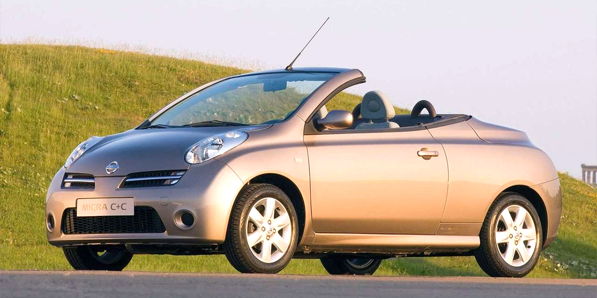 A Nissan Micra C+C with the roof down