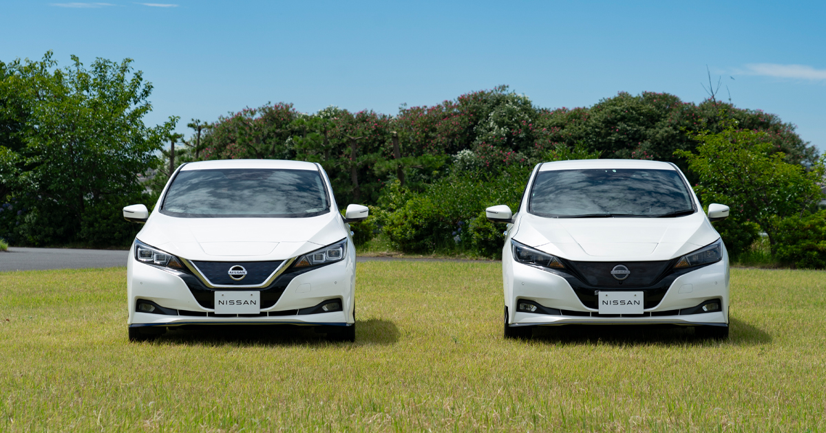 Two white Nissans