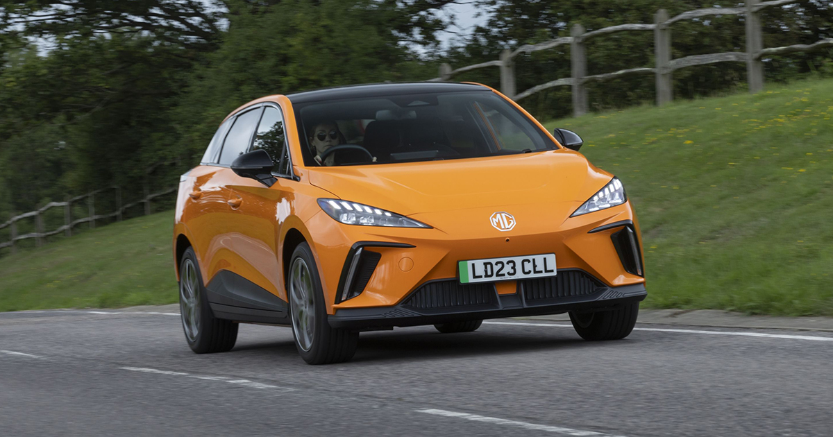 Orange MG4 driving