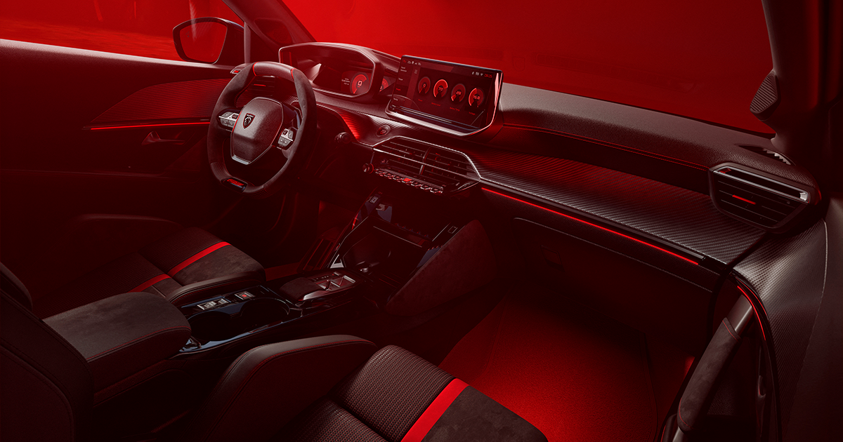 Interior shot of a red Peugeot 208 GTi