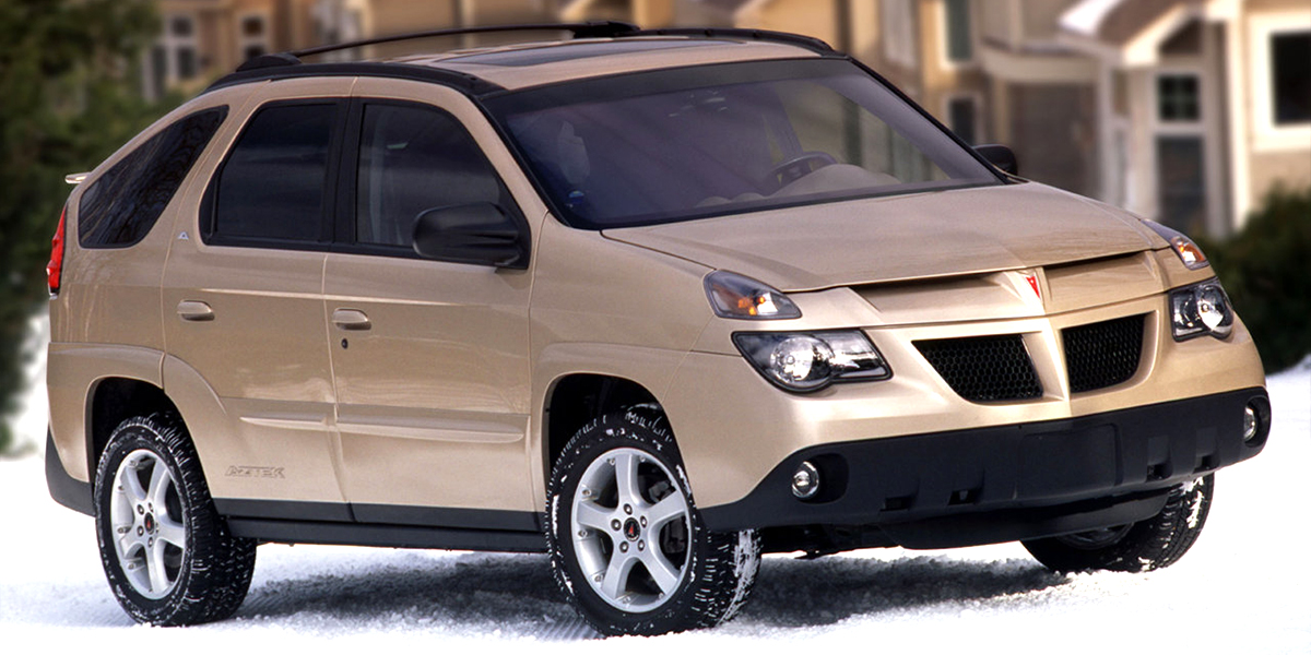 A Pontiac Aztek driving in the snow