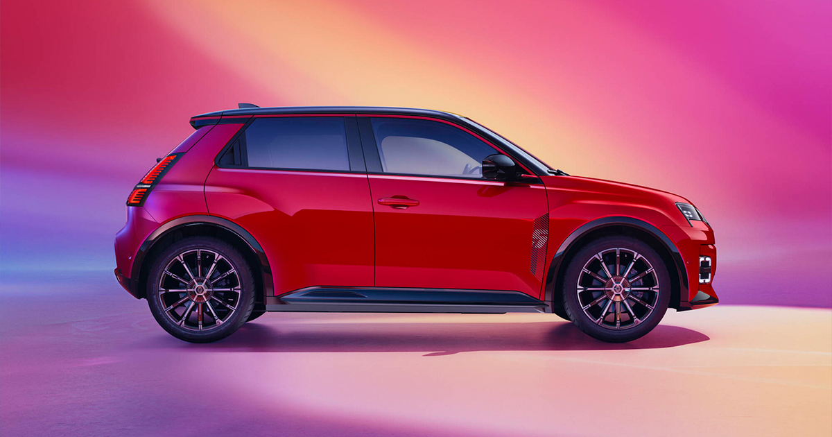 Side angle of the updated Renault 5 in Flame Red