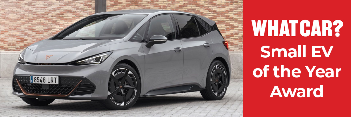 A grey Cupra Born parked on the pavement