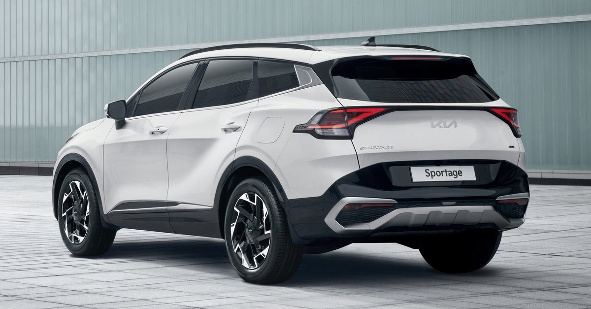 Rear view of a white Kia Sportage parked on a pavement