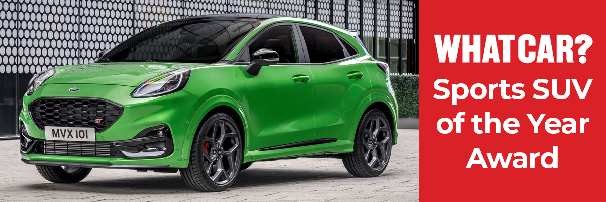 A green Ford Puma ST parked on the pavement