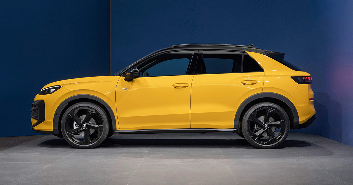 Side angle of a new yellow Volkswagen T-Roc