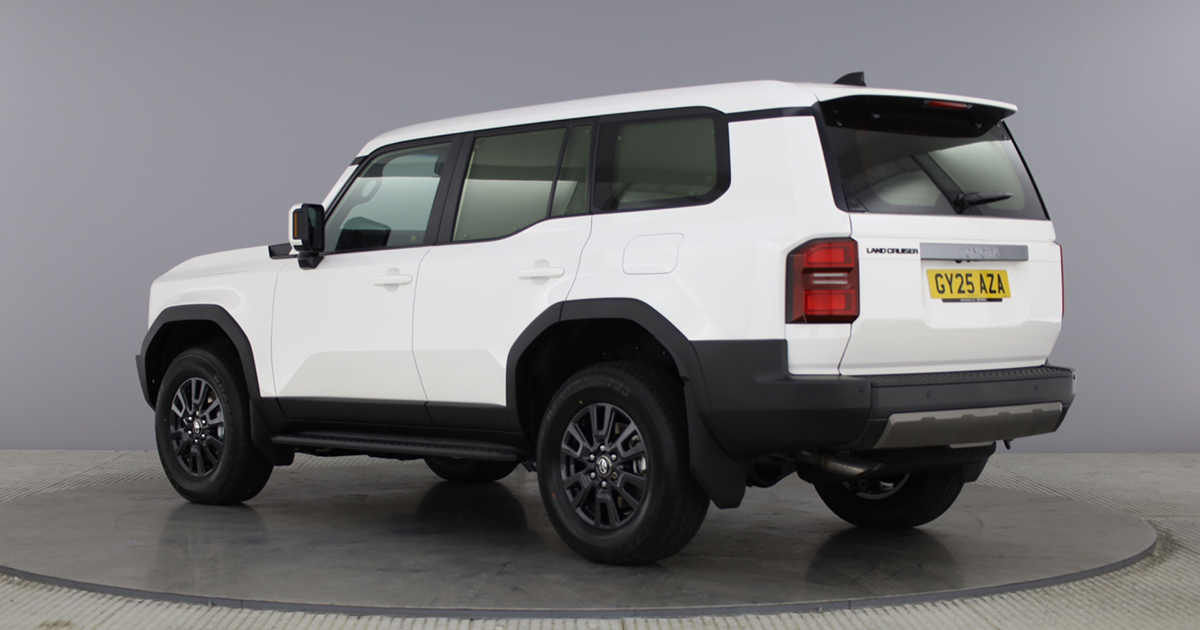 Rear angle of a white Toyota Land Cruiser Commercial