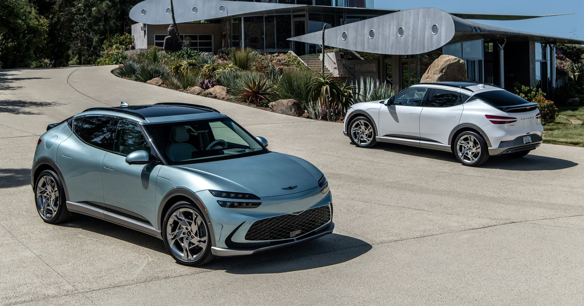 Two Genesis GV60s parked