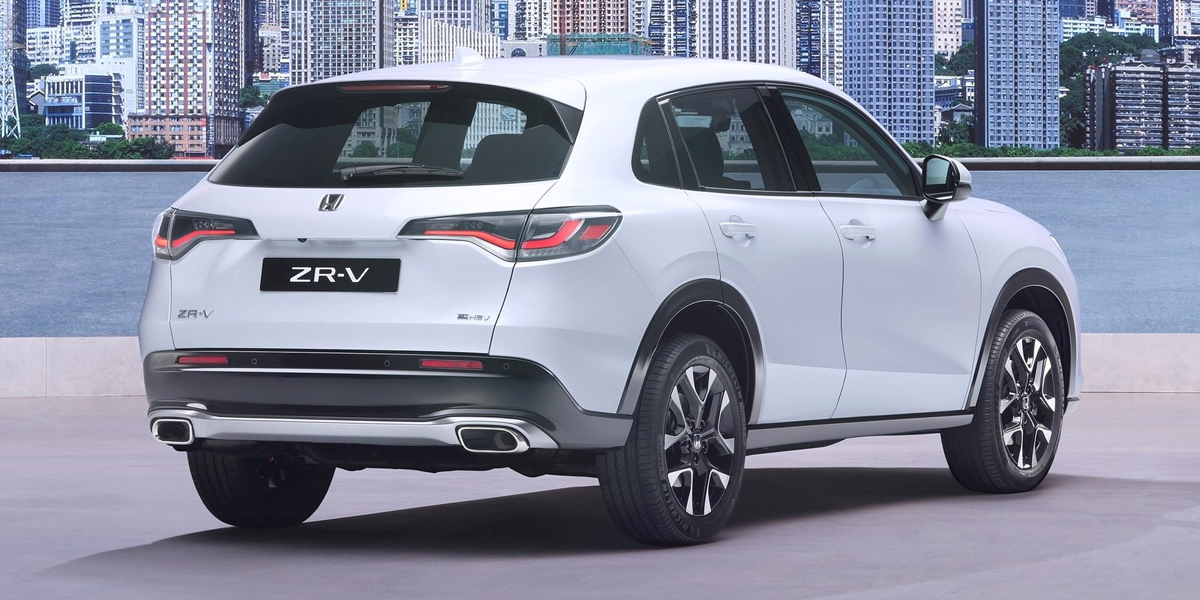 Rear view of a Honda ZR-V in front of a cityscape