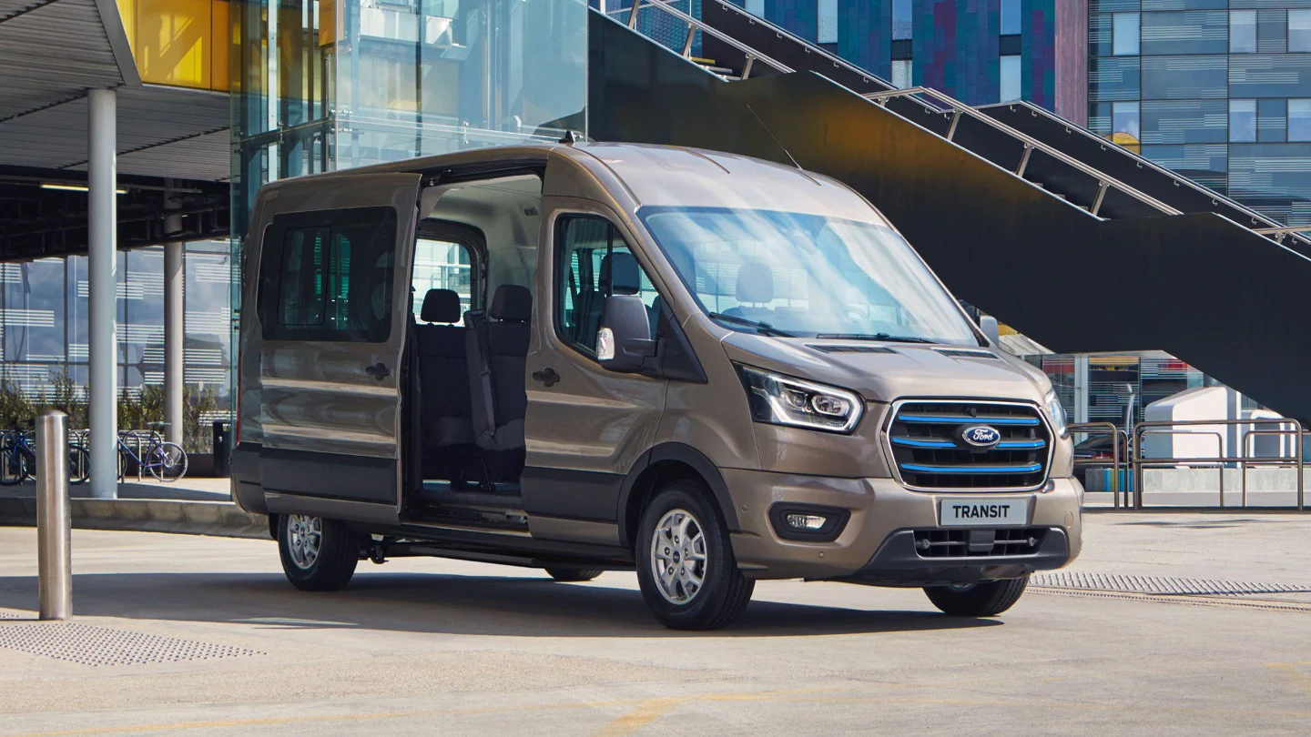 Side view of an electric Ford e-Transit with the side sliding door open