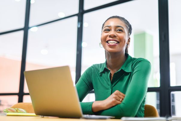 A person sat at their desk exploring how a salary sacrifice car scheme would benefit their business.