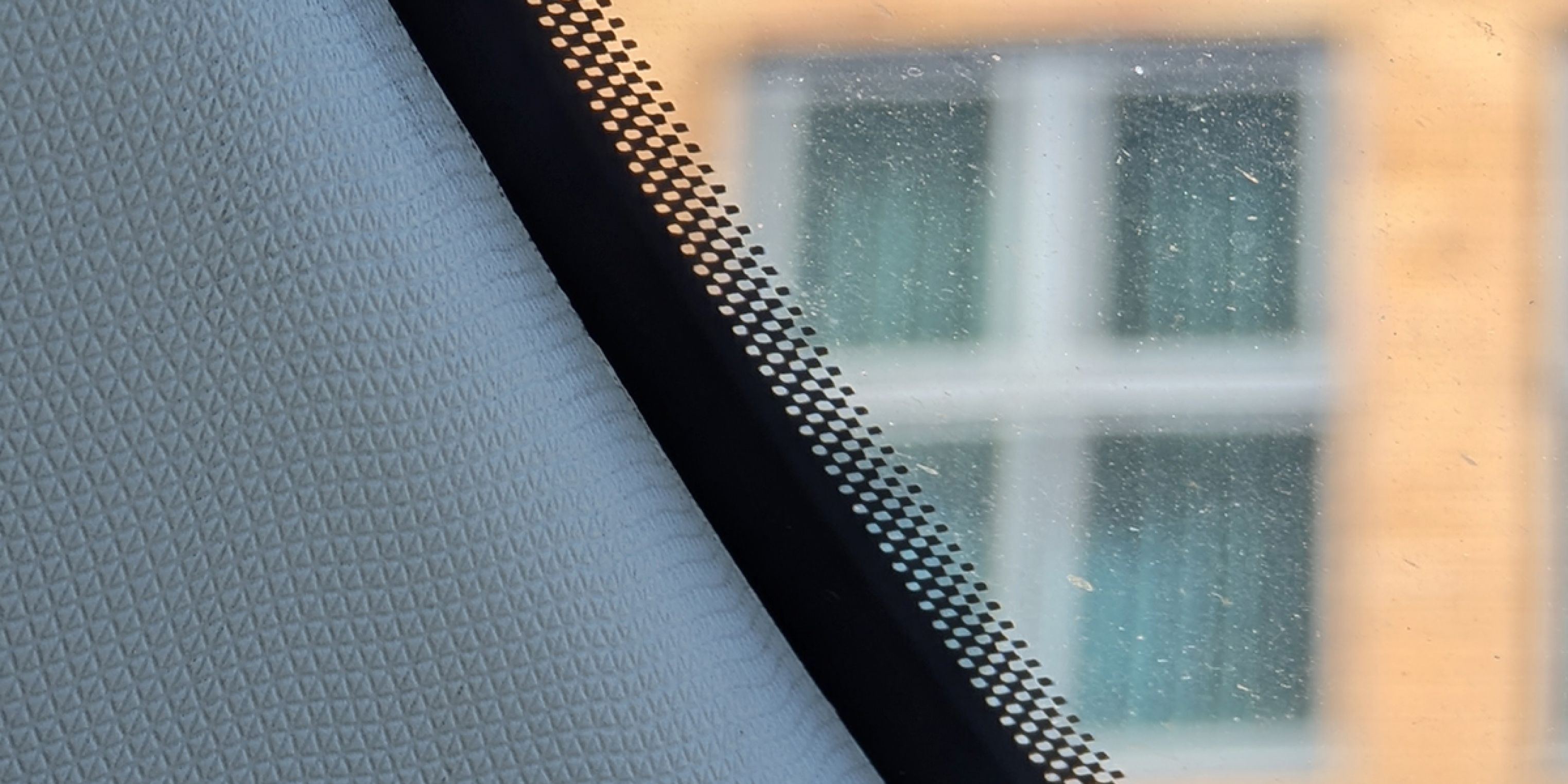 What Are the Black Dots on a Car Windscreen For?