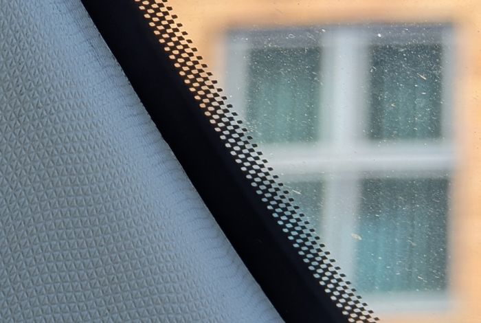What Are the Black Dots on a Car Windscreen For?